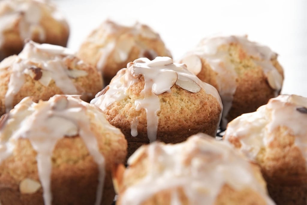 muffins with lemon glaze and sliced almonds