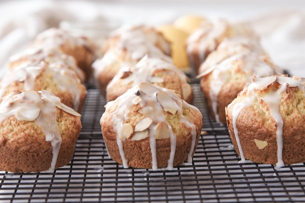 Lemon Almond Muffins cooling on a rack