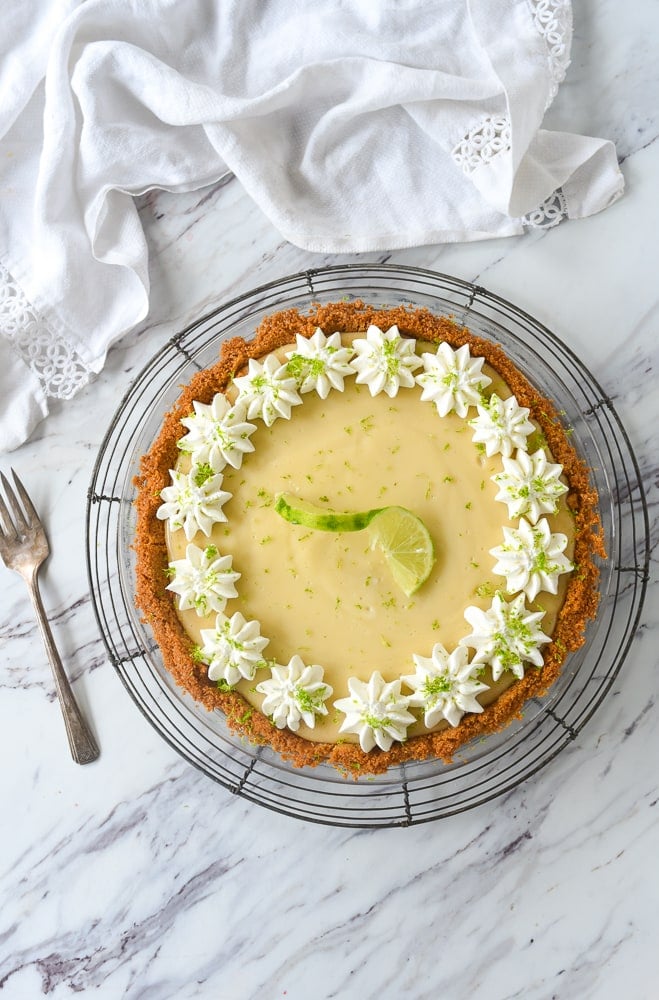 key lime pie with whipped cream on top.
