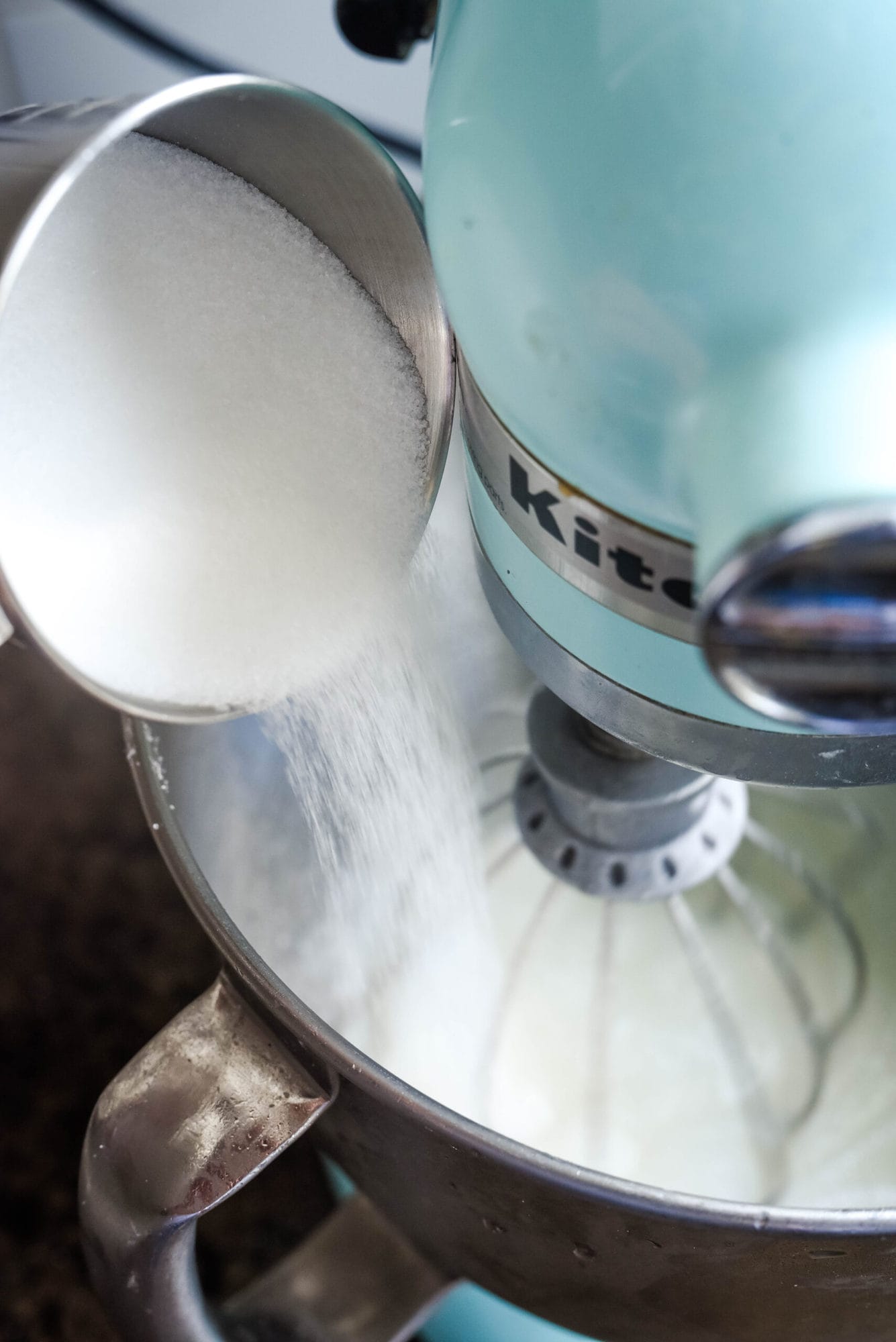 adding sugar to egg whites