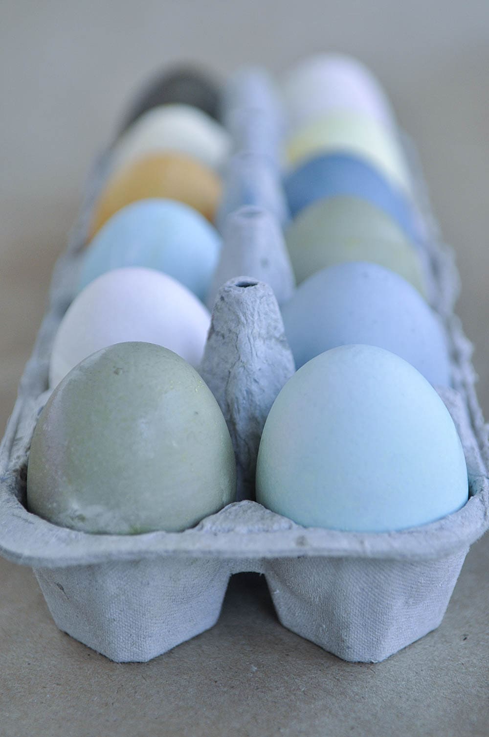 dyed easter eggs in egg holder