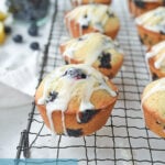 lemon blueberry muffins on a cooling rack