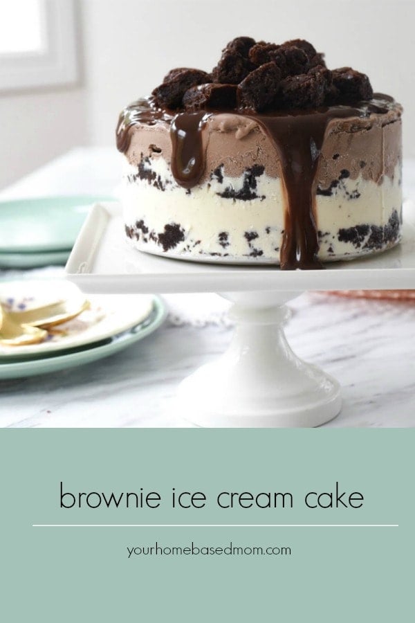 Brownie Ice Cream Layered Cake topped with hot fudge sauce