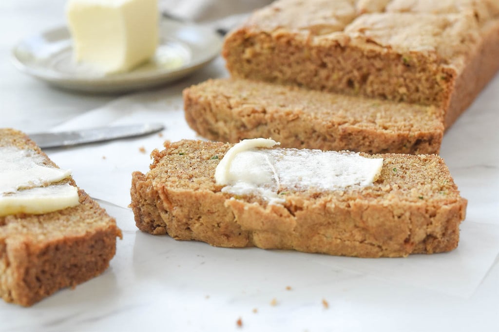 zucchini bread sliced and buttered