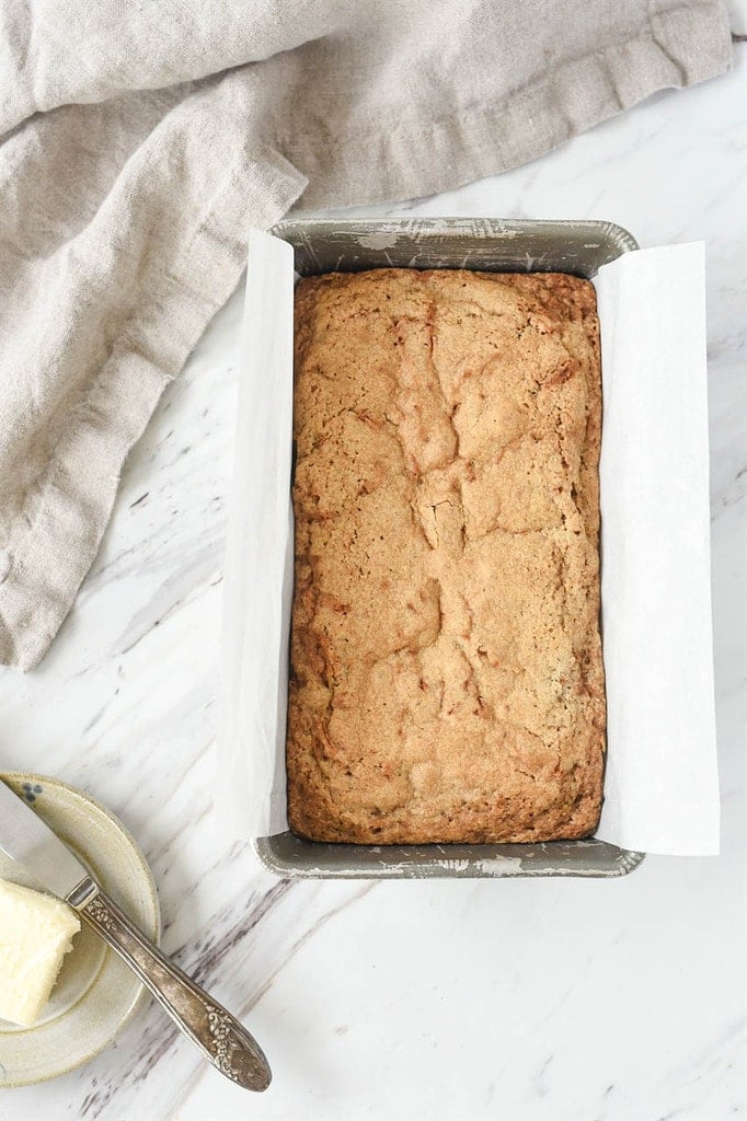 Loaf of Zucchini Bread in a parchment lined bread pan