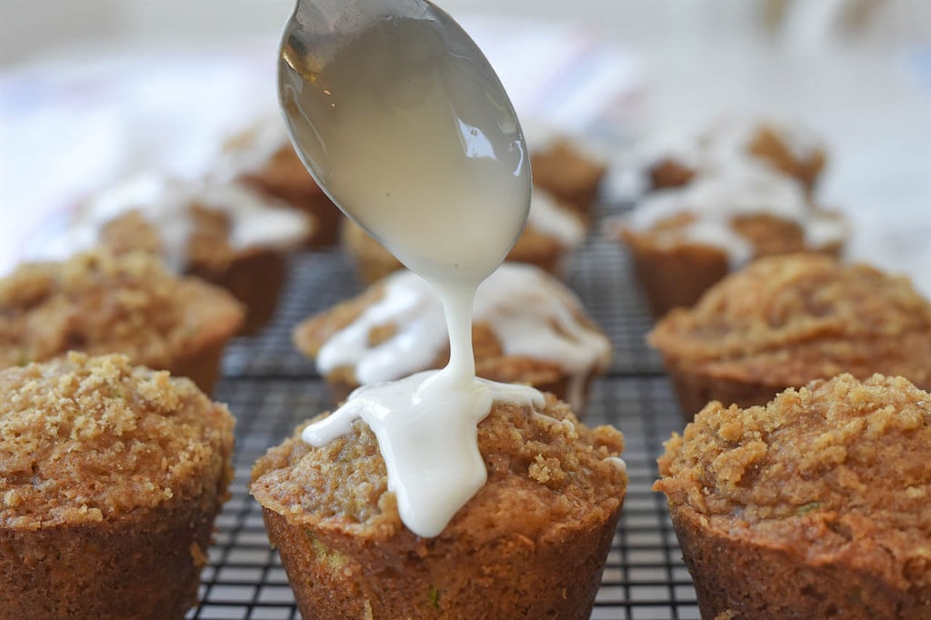 topping zucchini muffins with lemon glaze