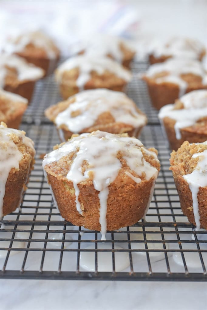 Zucchini Muffins with Lemon Glaze on cooling rack