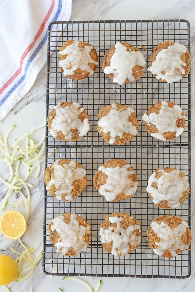 Zucchini Muffins with Streusel Topping and Lemon Glaze on cooling rack