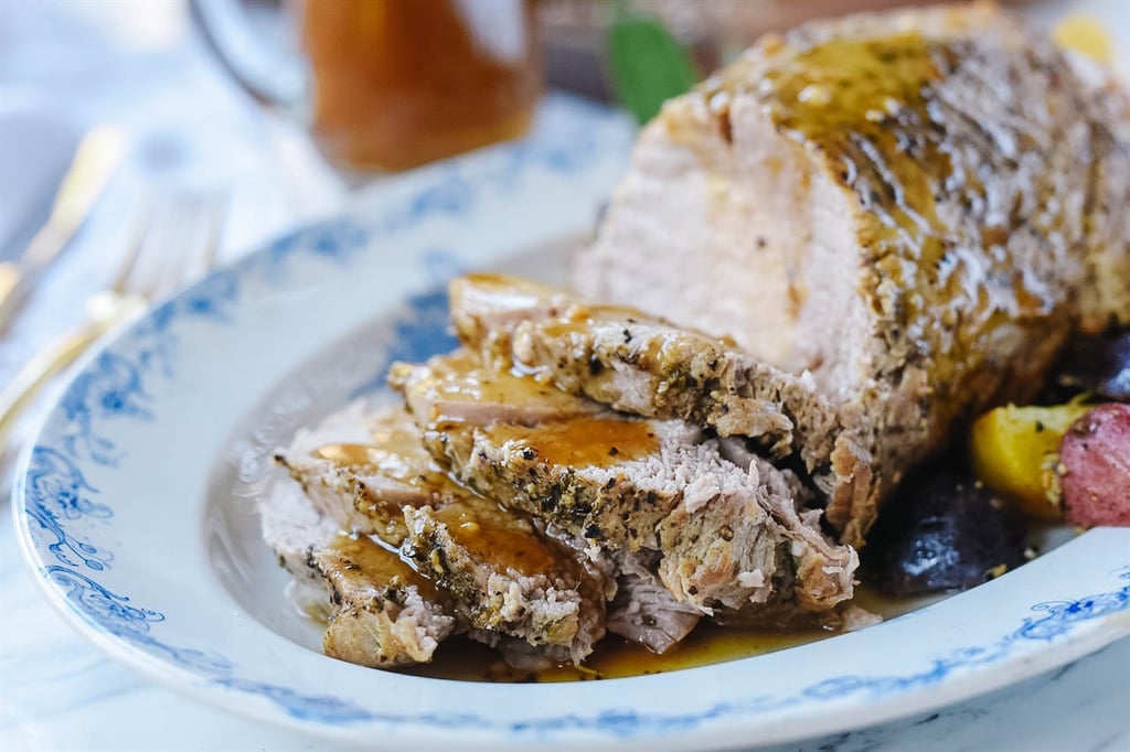 Instant Pot Maple Glazed Pork Loin served on a platter with potatoes