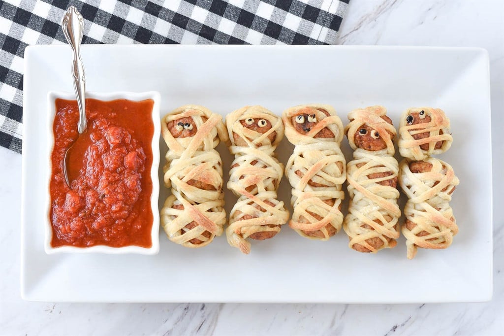 five Mummy wrapped Meatballs