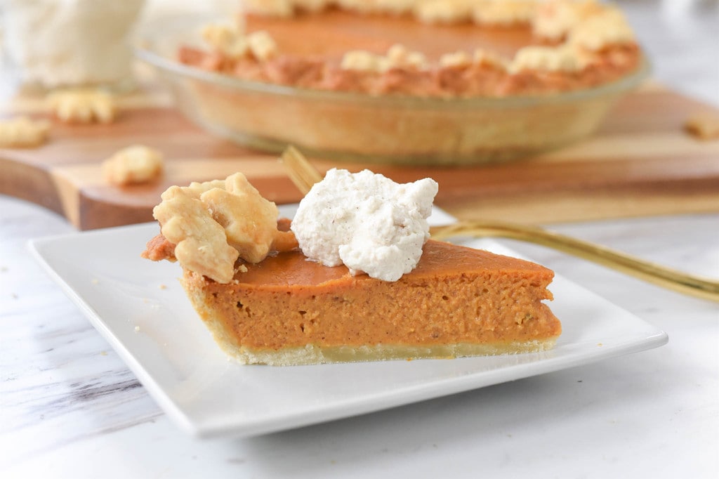 a slice of pumpkin pie on a plate