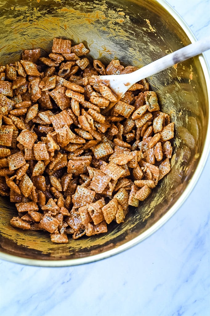 Chex Mix covered in cookie butter for puppy chow