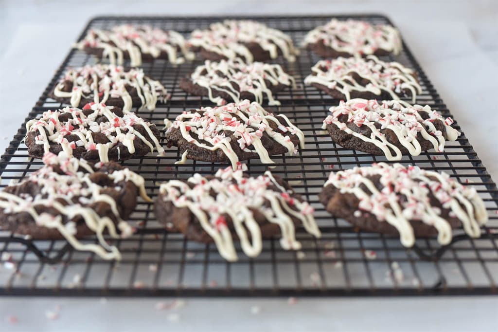 chocolate candy cane cookie drizzled with white chocoalte