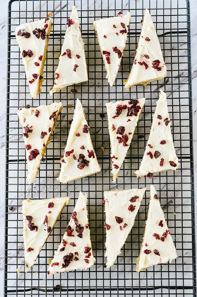 Cranberry Bliss Bars on a cooling rack