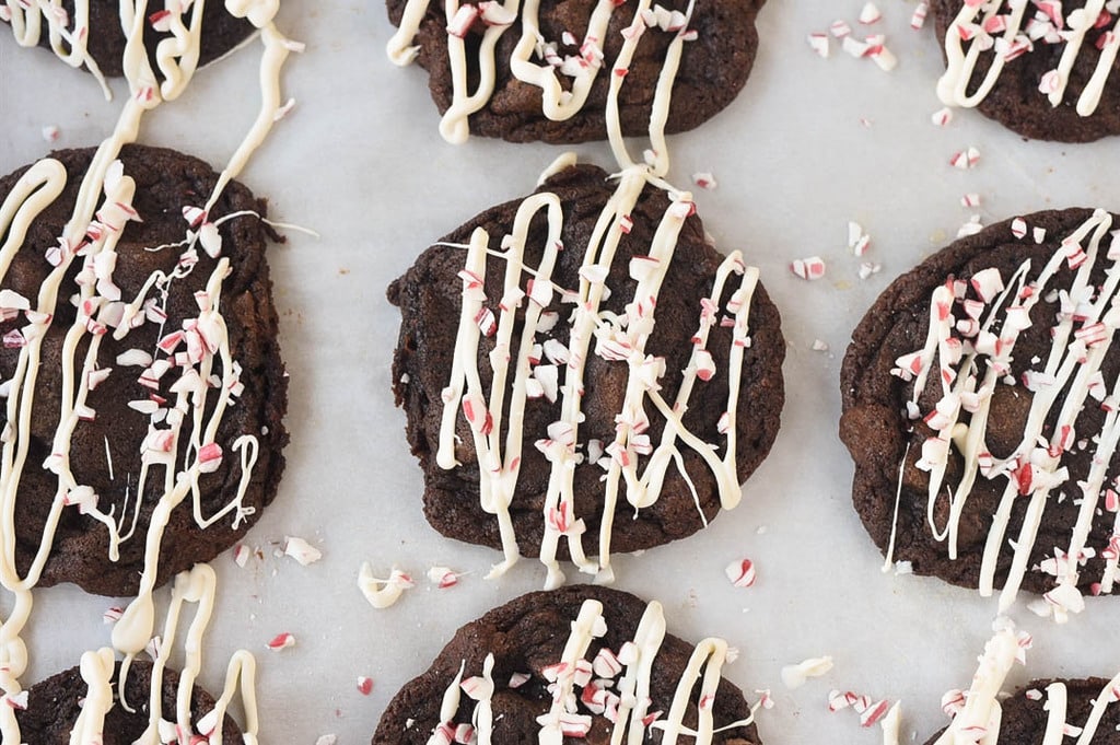 Chocolate candy cane cookies on parchment paper