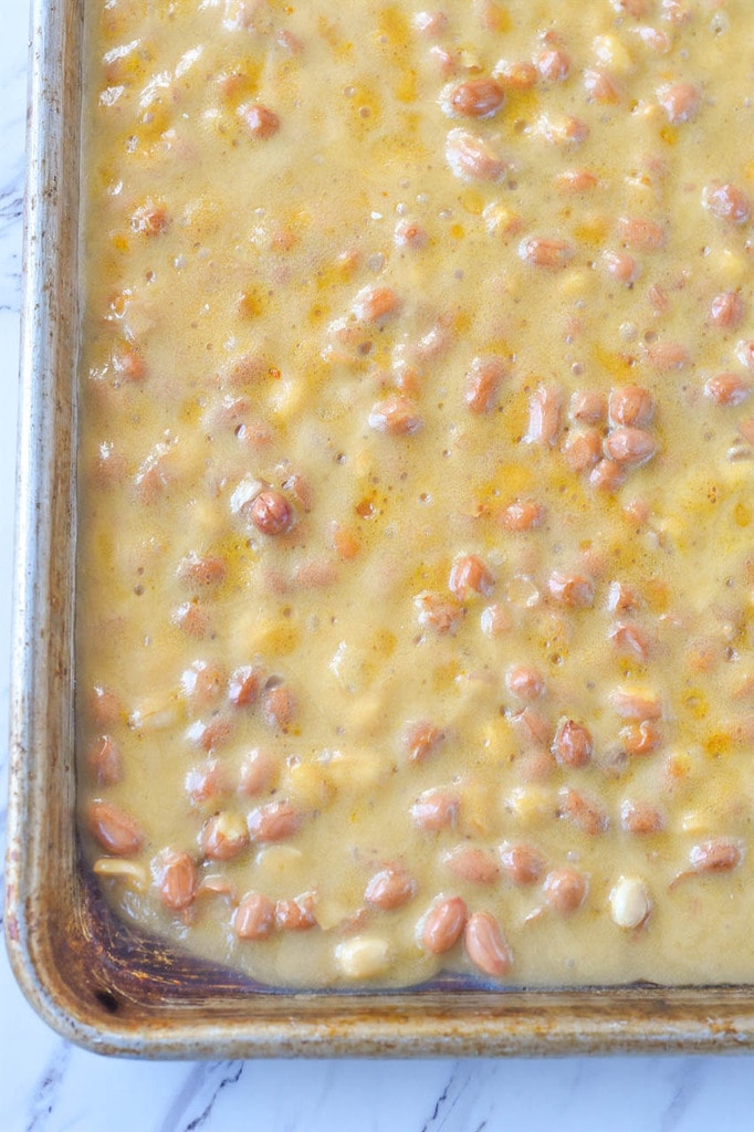 peanut brittle cooking in a pan