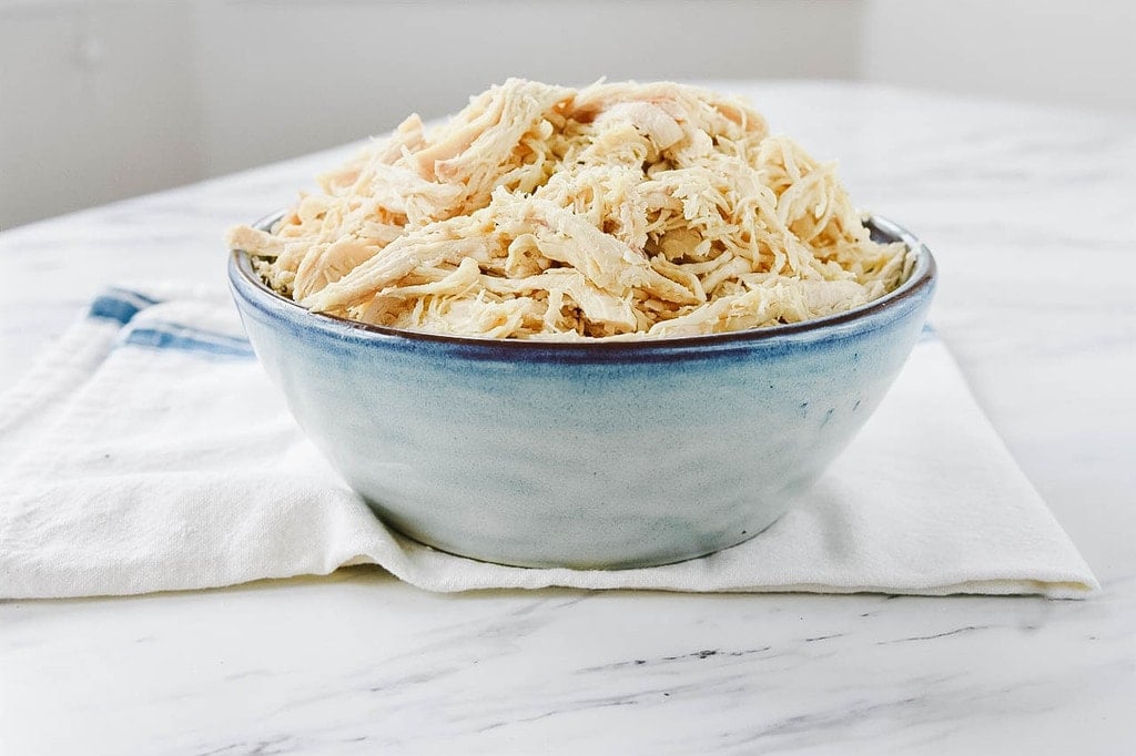 Instant Pot Shredded Chicken in a blue bowl
