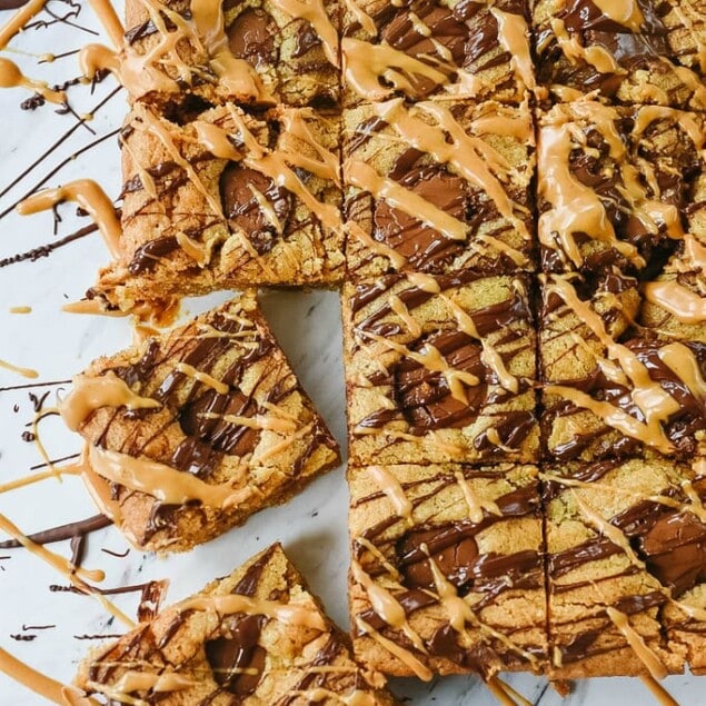 Peanut Butter Blondies drizzled with peanut butter