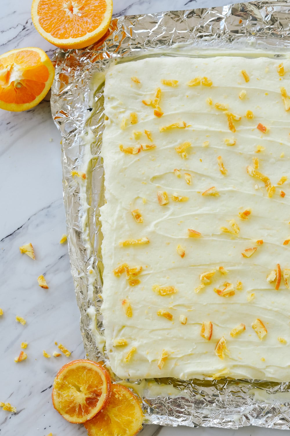 orange sugar cookie bars on foil