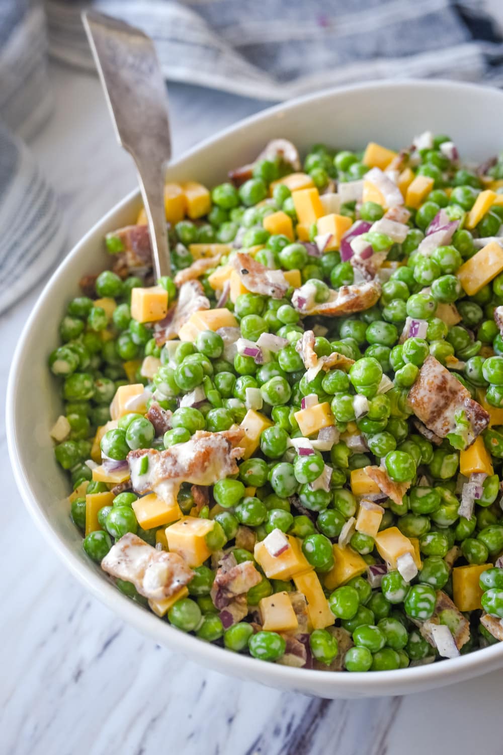 Classic Pea Salad in a white bowl