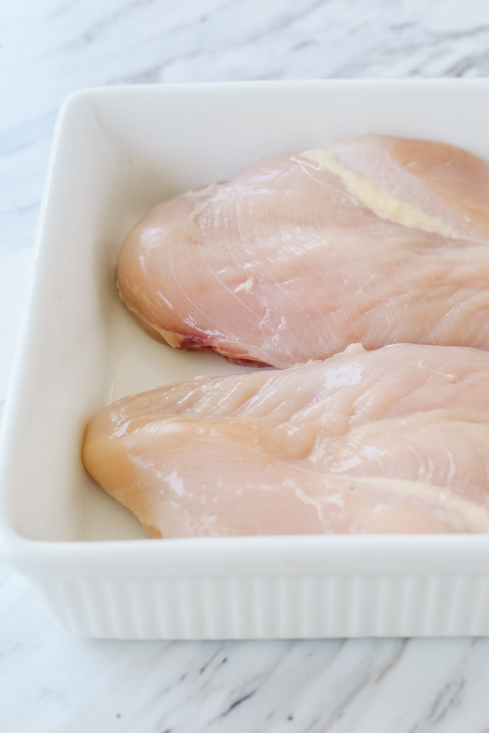 Chicken breasts in baking dish