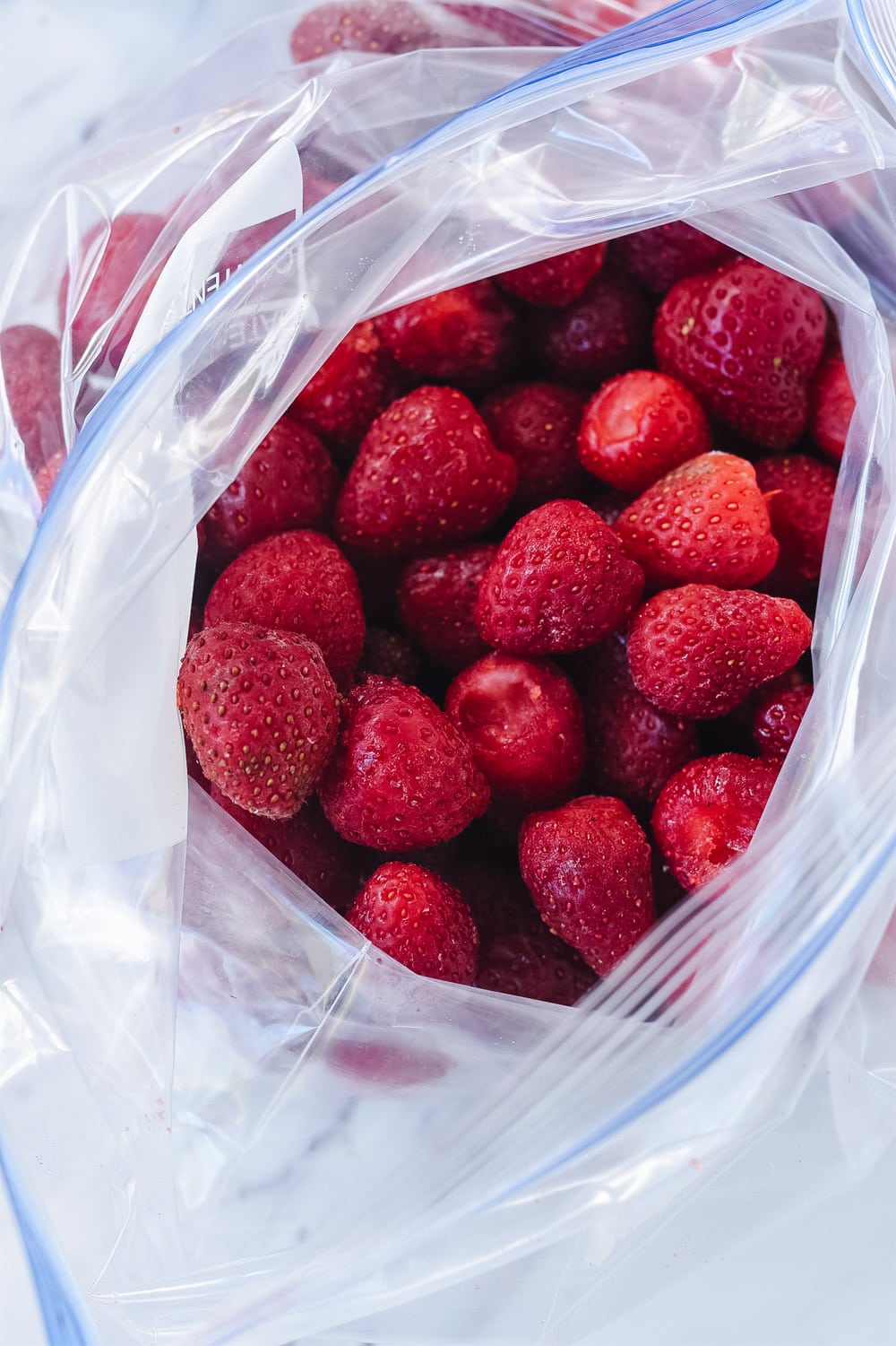 Frozen strawberries in a bag