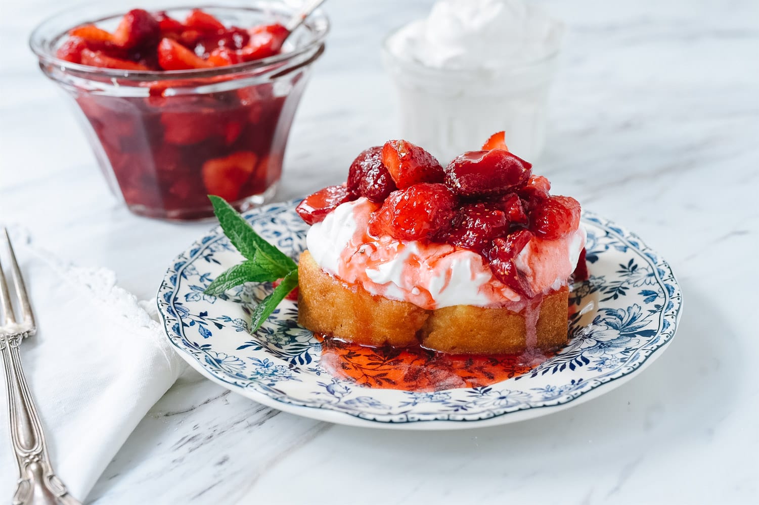 macerated strawberries on pound cake