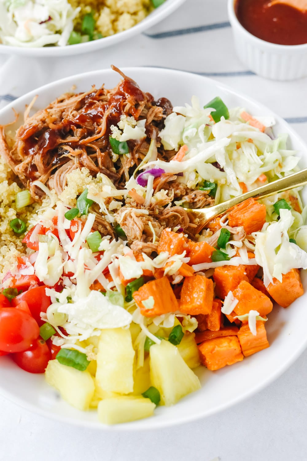 Fork in a bowl of pulled pork