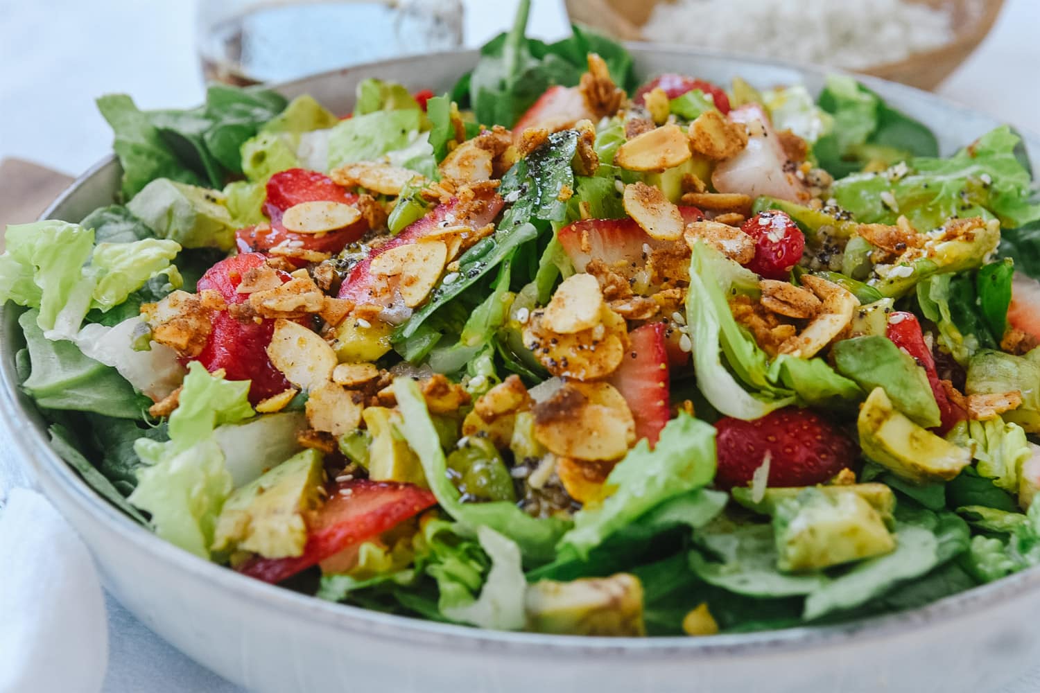 strawberry avocado salad with spiced nuts