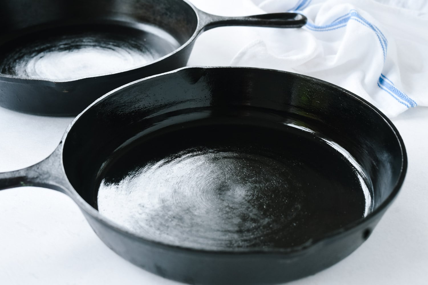 Two cast iron skillets