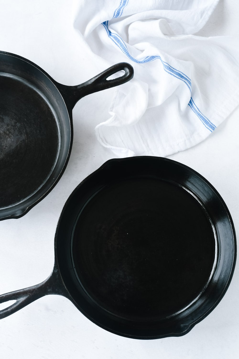 Two cast iron skillets