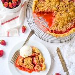 strawberry rhubarb pie on a cooling rack