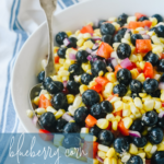 white bowl of blueberry corn salad