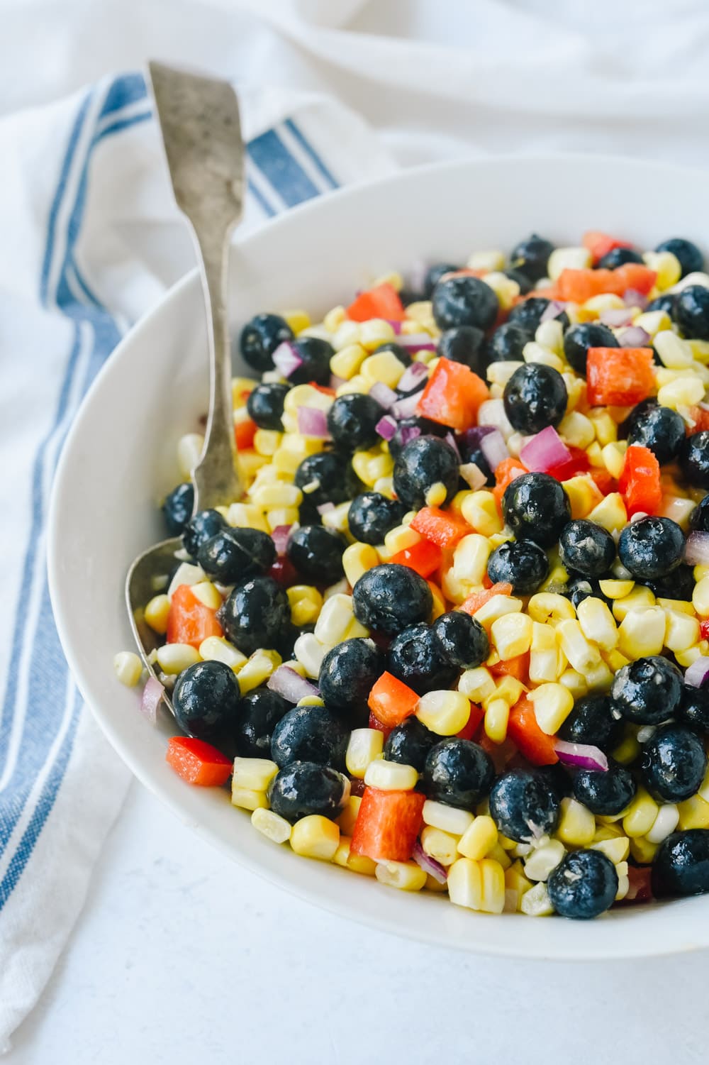 Blueberry Corn Salad with a spoon in it