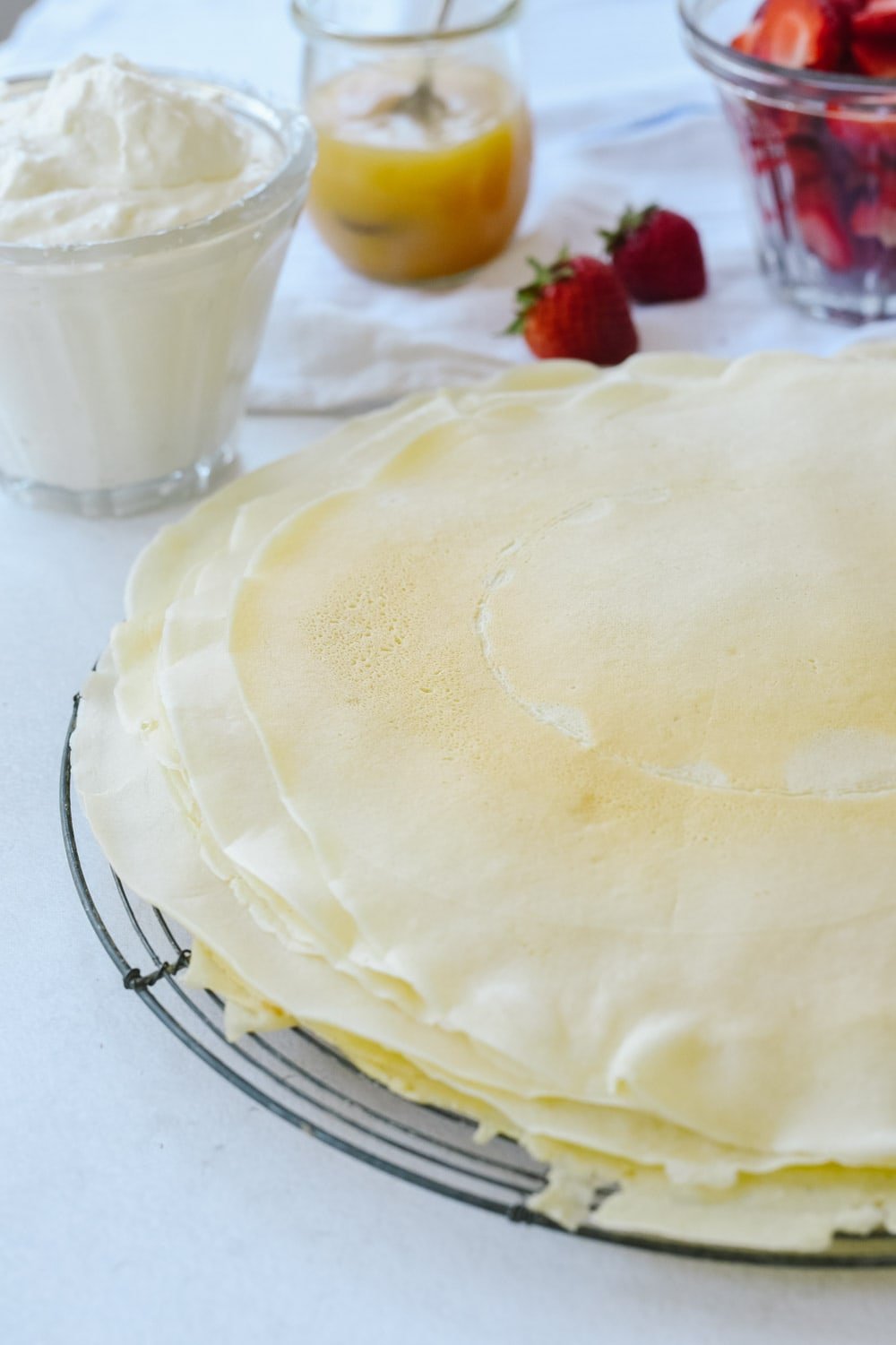 pile of crepes on a plate