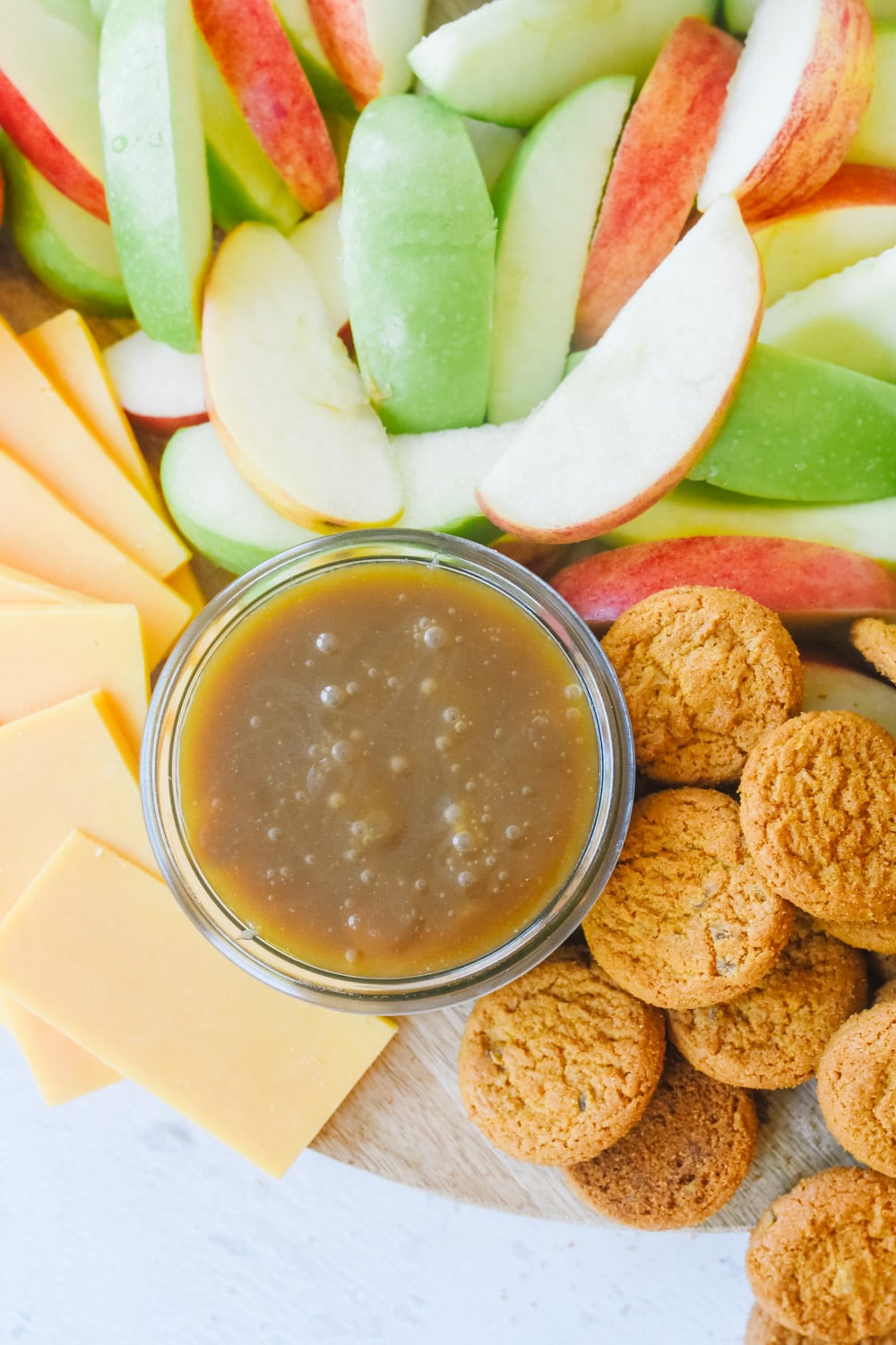 fall snack board with caramel sauce