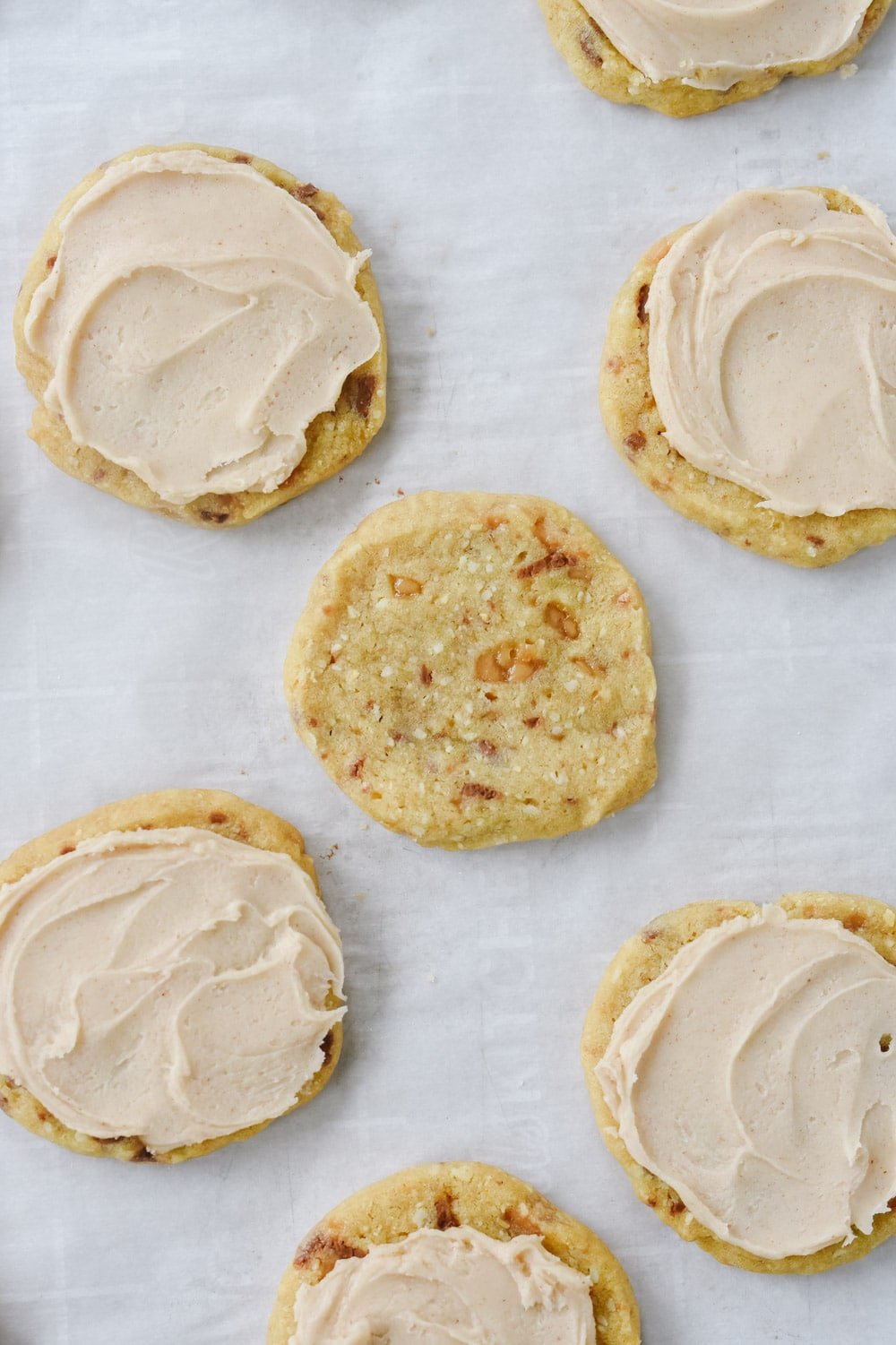 almond toffee cookies with frosting