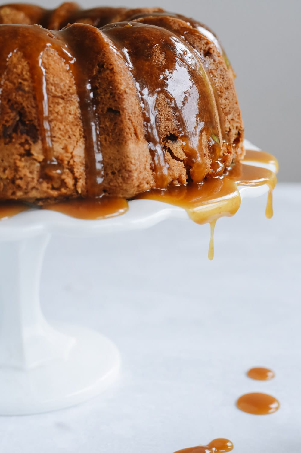 caramel apple bundt cake Apple Caramel cake on a cakestand