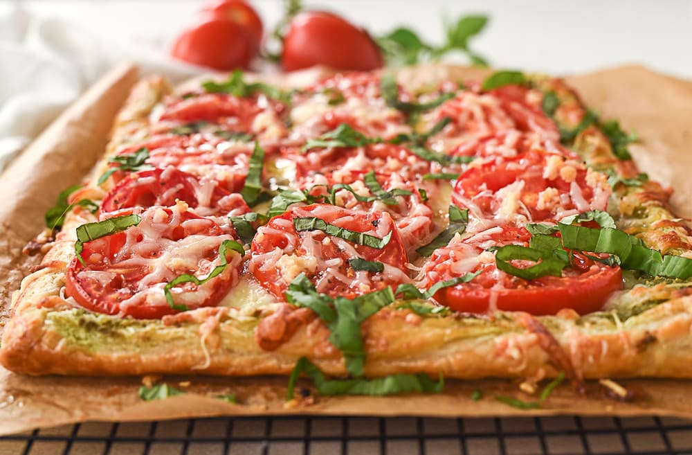 slices of tomato tart on brown paper