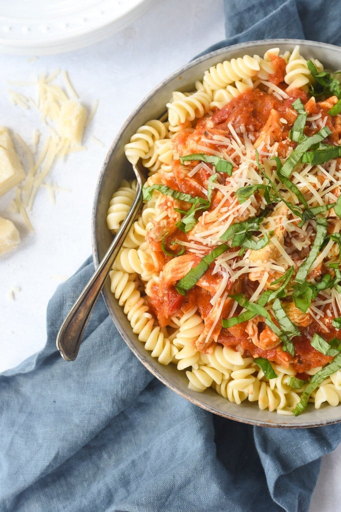 CHicken and Tomato Pasta in a bowl with a fork