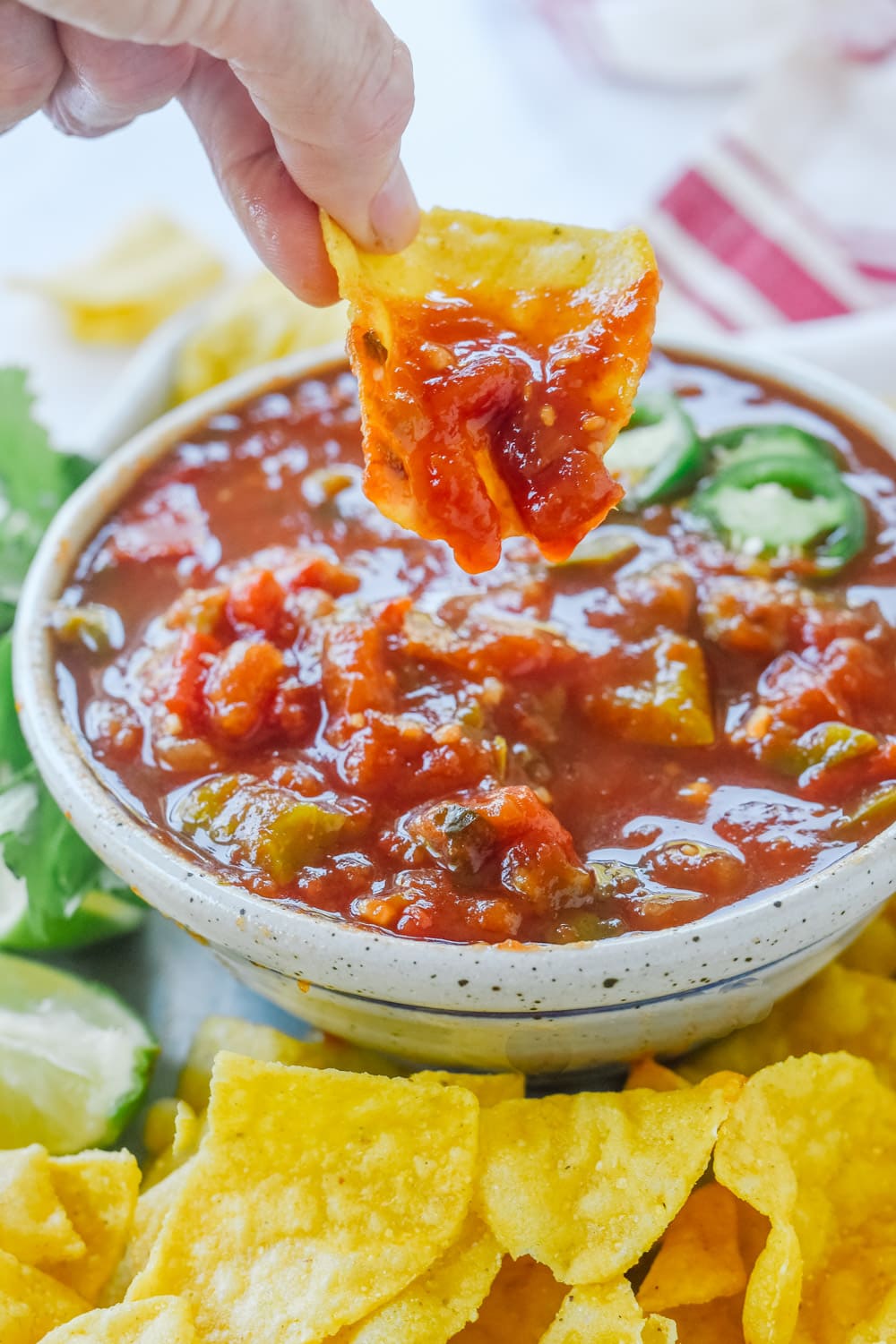 Dipping chip into salsa