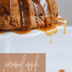 apple bundt cake with caramel sauce dripping off of it.