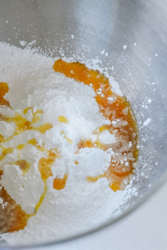 brown butter and powdered sugar in a bowl