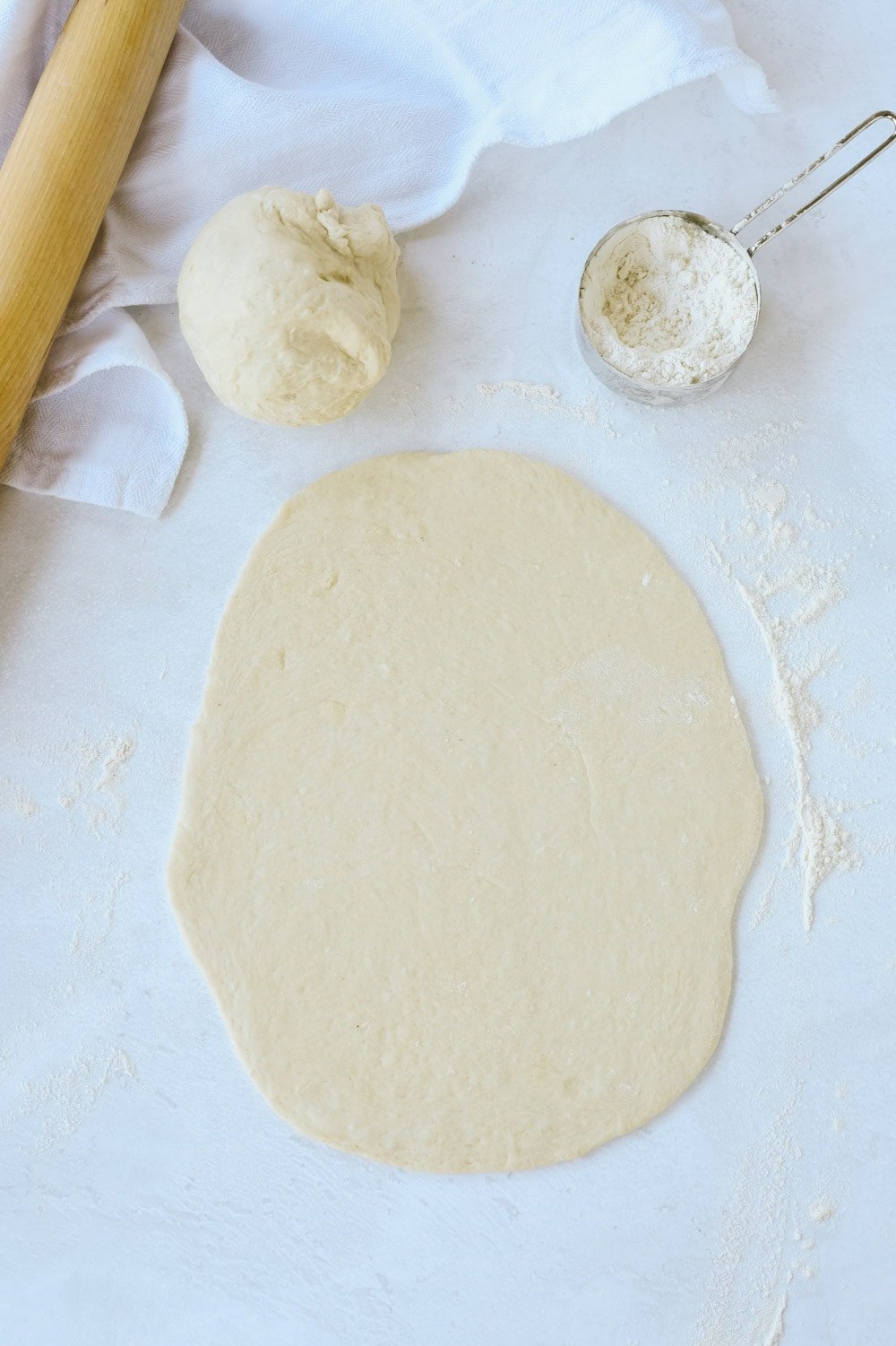 rolled out dough for flatbread