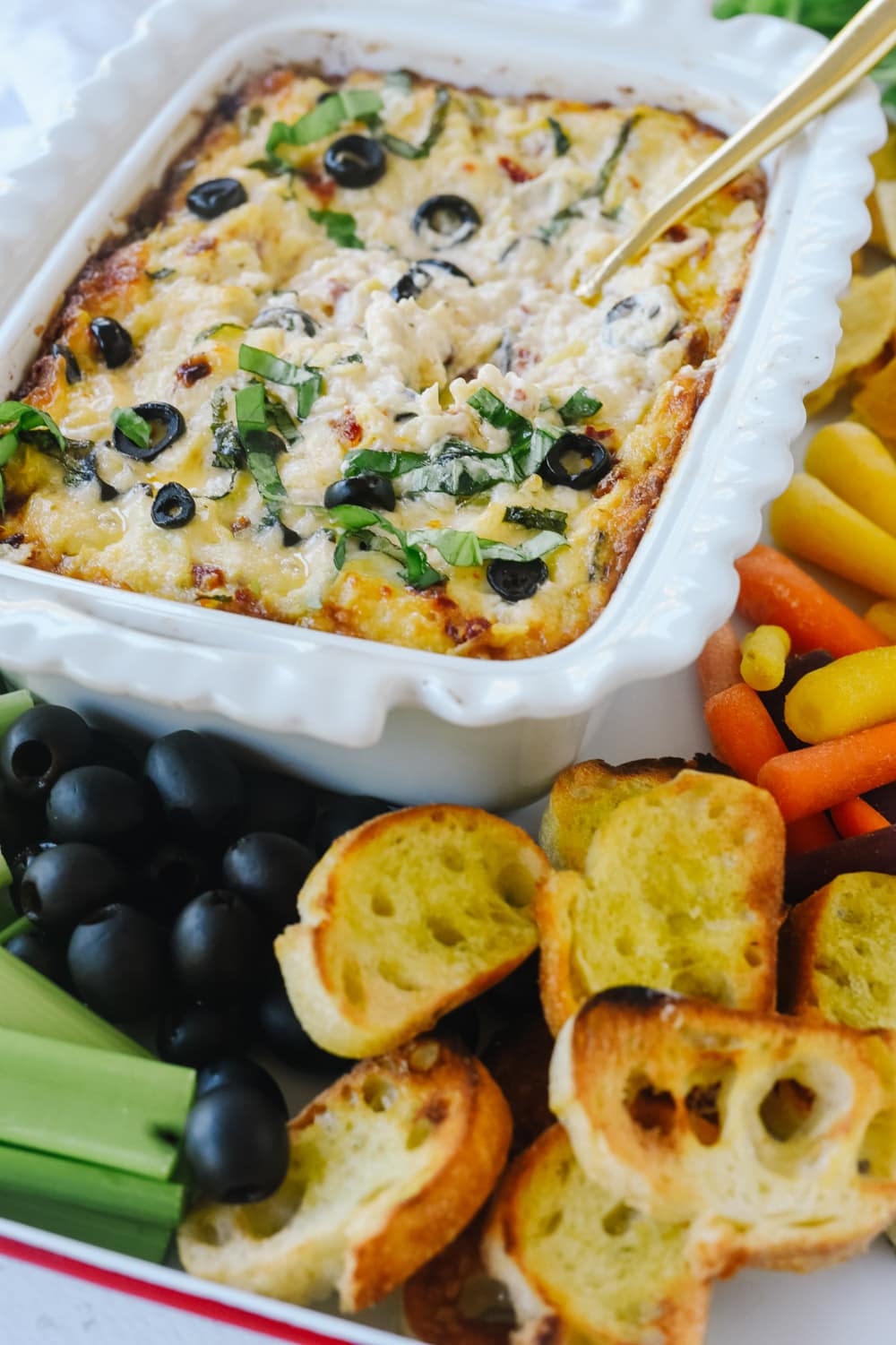 hot olive artichoke dip with bread