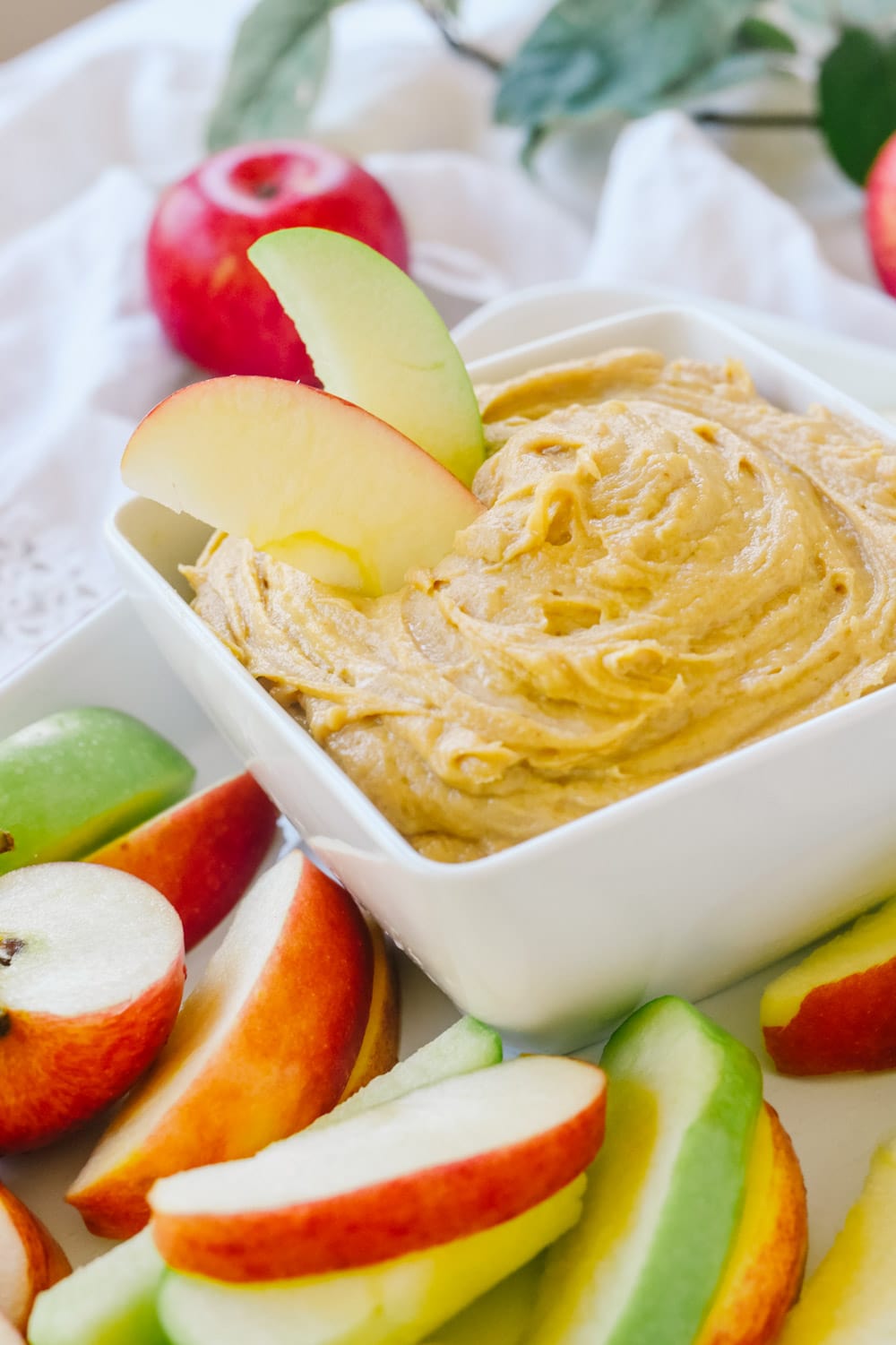 peanut butter dip with apples in it