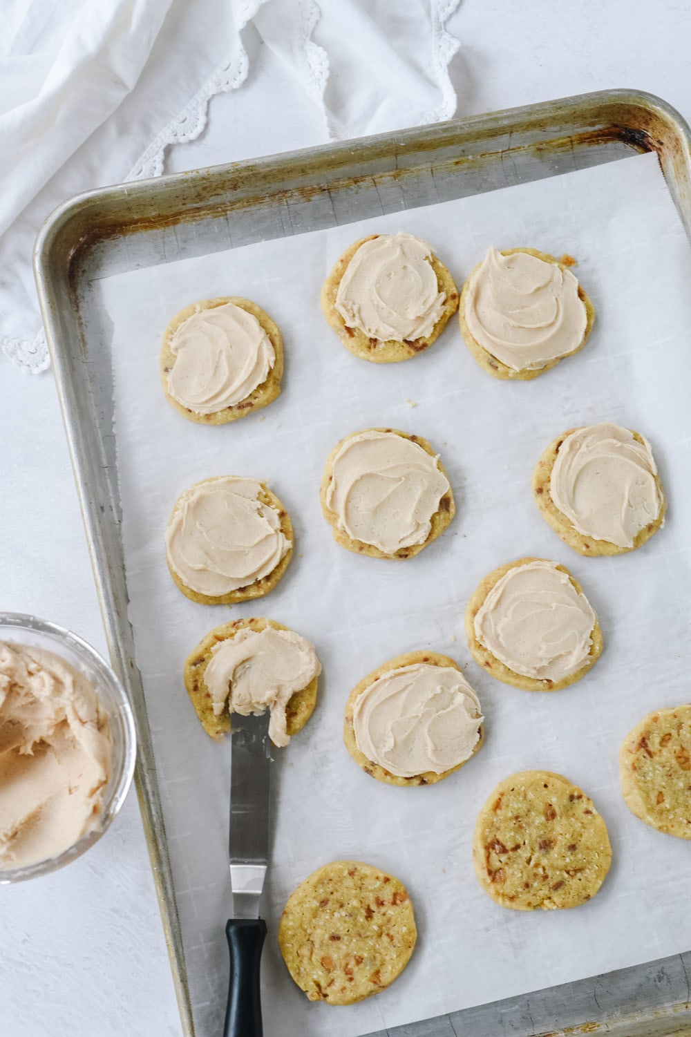 Frosting almond toffee cookies