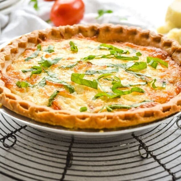 tomato Basil tart cooling on a rack