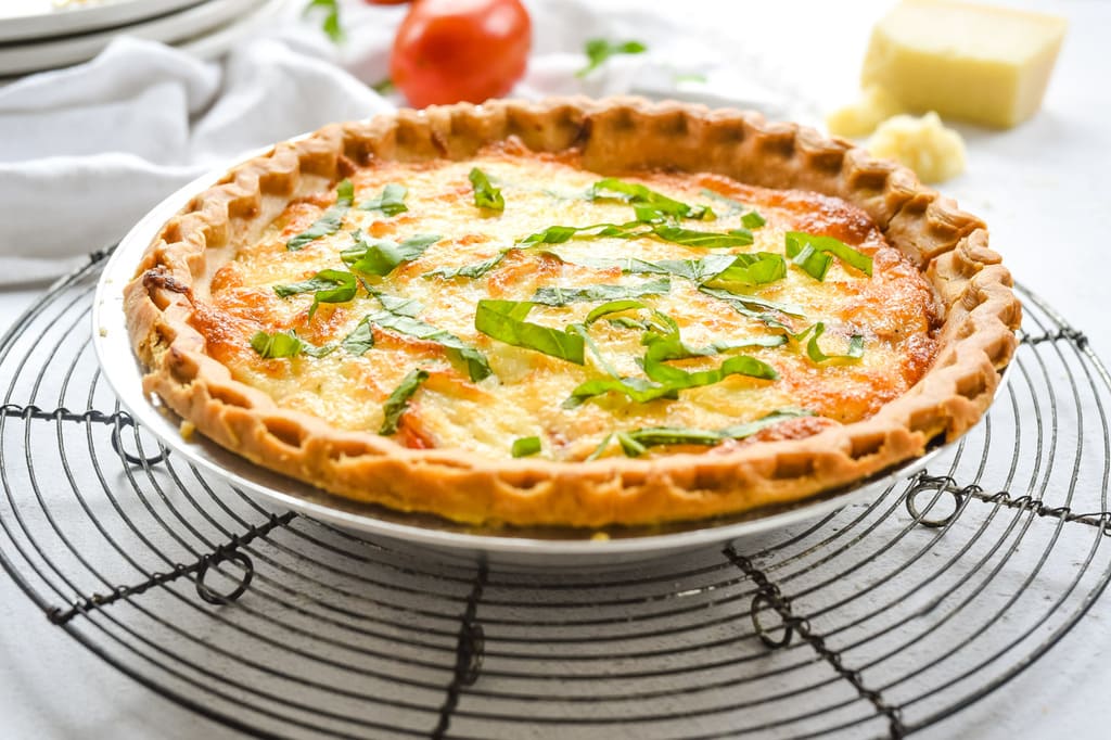 tomato Basil tart cooling on a rack