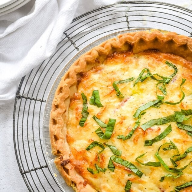 Tomato Basil Tart with basil on top